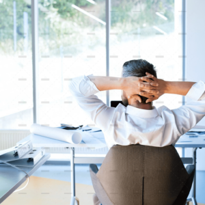 demo-attachment-477-Businessman-at-the-desk-in-his-office-resting.