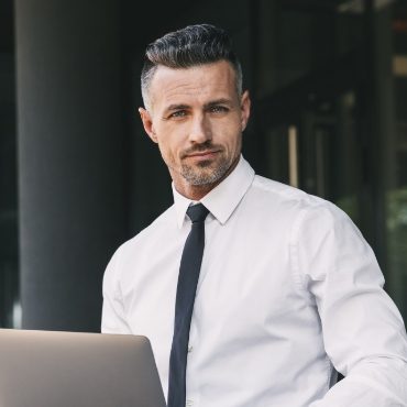 portrait-of-a-successful-young-businessman-YJVR3KZ.jpg
